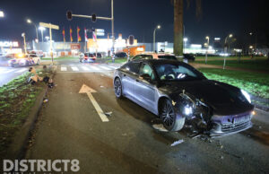 Porsche total loss na flinke crash Rijswijkse Waterweg Den Haag