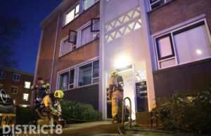 Gezin met kinderen nagekeken door ambulancedienst na woningbrand Koekangestraat Den Haag