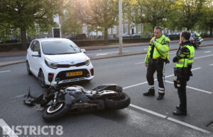 Weg afgesloten na ongeval tussen auto en motor Koningskade Den Haag