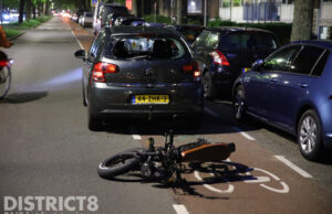 Fietser op fatbike botst op stilstaande auto Melis Stokelaan Den Haag