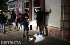 Verdachte aangehouden na vuurwapen melding in café Lorentzplein Den Haag