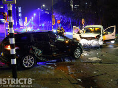 Veel schade na ongeval tussen auto en busje Schenkkade Den Haag