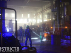 Grote hal van TU Delft pand vol met rook Stevinweg Delft