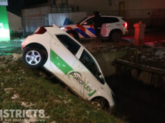 Automobilist gaat te hard door de bocht en belandt in water Coldenhovelaan De Lier