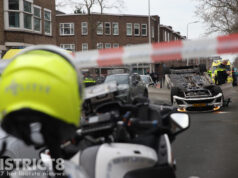 Auto over de kop, drugs in beslag genomen en bestuurder aangehouden na aanrijding Zuiderparklaan Den Haag