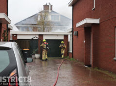Flinke rook bij brand in tuin Mijlpaal Den Haag