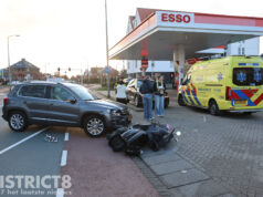 Opzittenden van scooter gewond bij aanrijding Oosteinde Den Haag