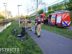 Zoekactie in water na aantreffen scootmobiel langs waterkant Rijksstraatweg Delft