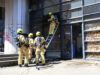 Brandweer blust brand in afzuiging van restaurant Barbarasteeg Delft