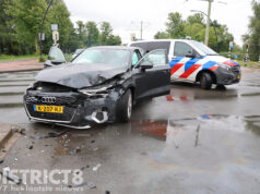 Flinke schade na aanrijding op kruispunt Erasmusweg Den Haag