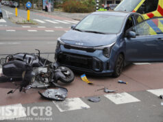 Twee gewonden bij aanrijding tussen auto en scooter Goudenregenstraat Den Haag