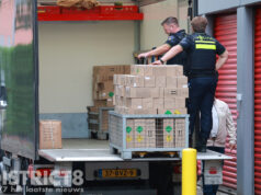 Grote hoeveelheid lachgasflessen aangetroffen in opslagbox na melding persoon met vuurwapen Kleveringweg Delft