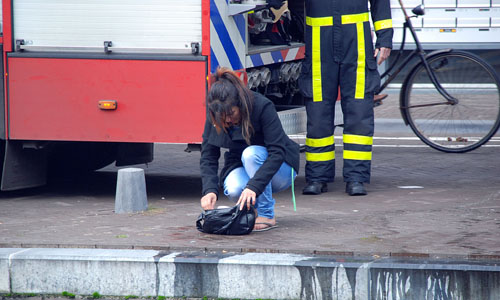 21 oktober Fiets en tas te water Veenkade Den Haag