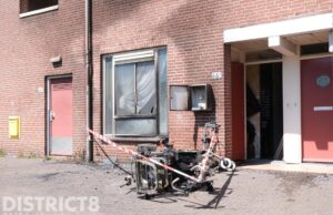 Scootmobiel vat vlam en woning beschadigd Zuidwal Den Haag