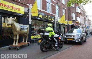 Overval op tweedehandswinkel; verdachte lopend er vandoor Prinsegracht Den Haag