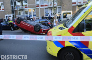 Auto over de kop na ongeval Bouwlustlaan Den Haag