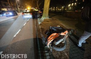 Scooterrijder komt hard ten val na aanrijding Wassenaarseweg Den Haag