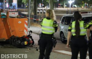 Scooterrijder ernstig gewond na ongeval met bouwafval container Mathenesserdijk Rotterdam