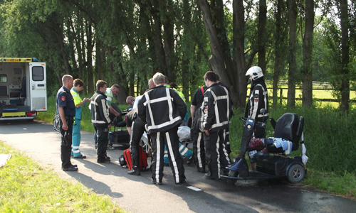 6 juni Vrouw met scootmobiel te water in Albrandswaard