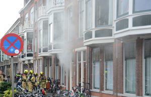 17 december Bewoners naar het ziekenhuis na brand in woning Koningin Emmakade Den Haag