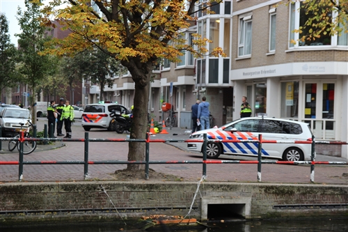 6 oktober Politie schiet man die vuurwapen trok neer in centrum Boomsluiterskade Den Haag