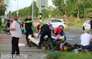 Gewonden na ongeval tussen auto en scooterrijder Oude Middenweg Den Haag