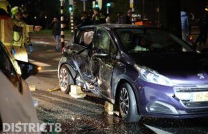 Inzittende bekneld na aanrijding tussen personenauto’s Erasmusweg Den Haag