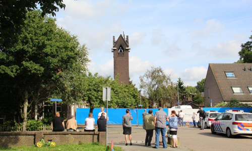 7 augustus Schade overdag goed zichtbaar na brand in kerk Zaandijkstraat Rotterdam