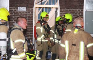 12 woningen ontruimd na brand op dak Westerbeekstraat Rotterdam