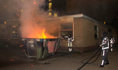 9 oktober Container tegen gebouw in brand Schiedam