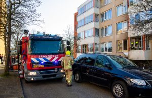 Brand in struiken overgeslagen naar flat Talmalaan Schiedam