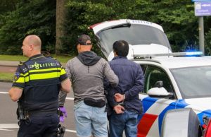 Auto klem gereden door landelijke eenheid politie Hargalaan Schiedam