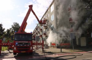 Portiek vol rook bij grote brand Lorentzlaan Schiedam